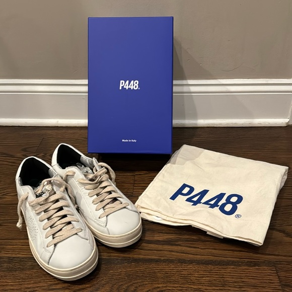 New in box P448 sneakers. White with metallic tongue. Size 41